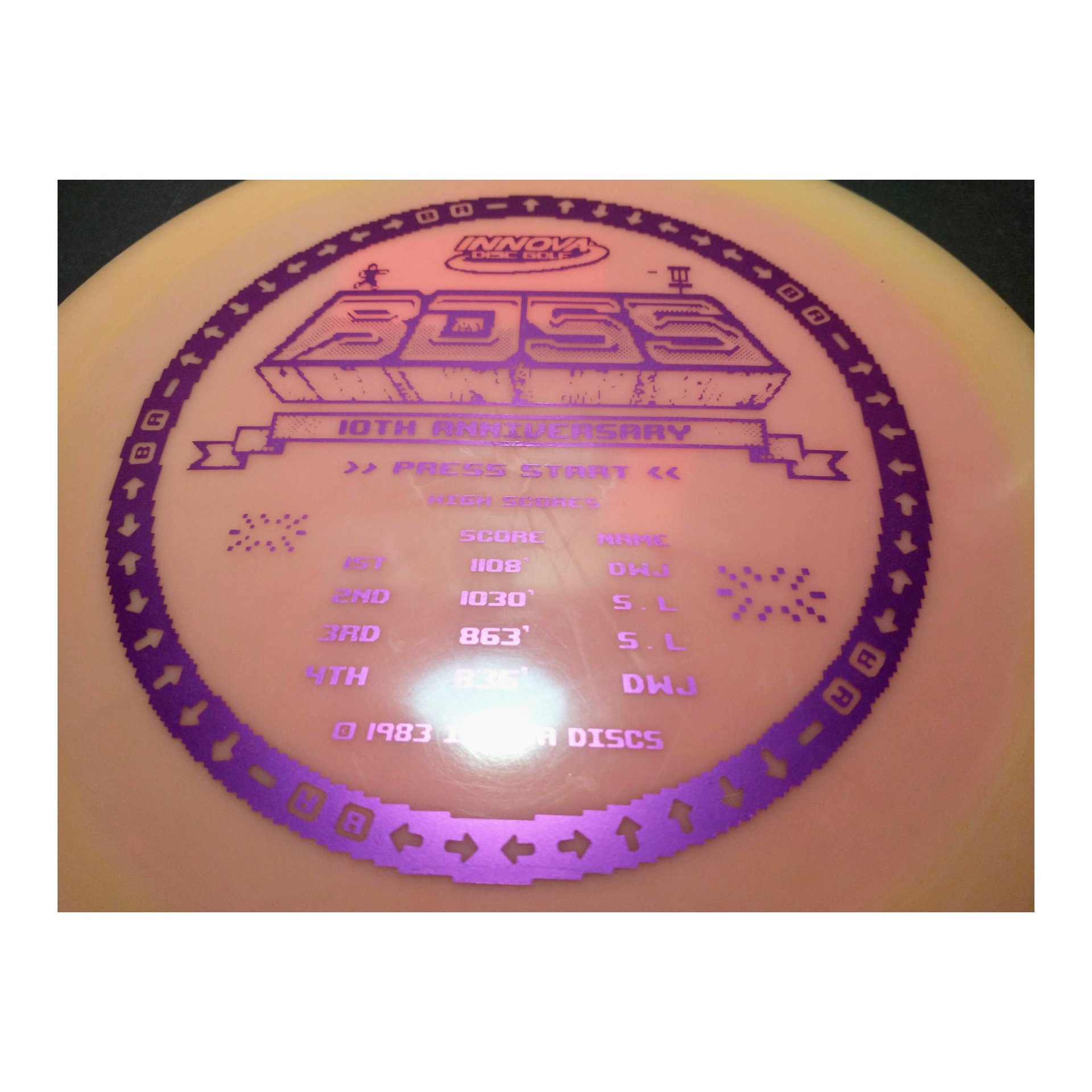 new 10th anniversary Star Boss 171 grams Innova disc golf purple on orange