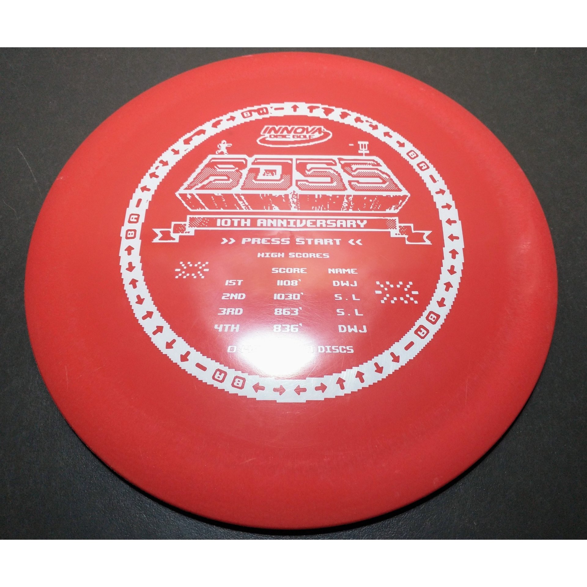 new 10th anniversary Star Boss 167 grams Innova disc golf white on red