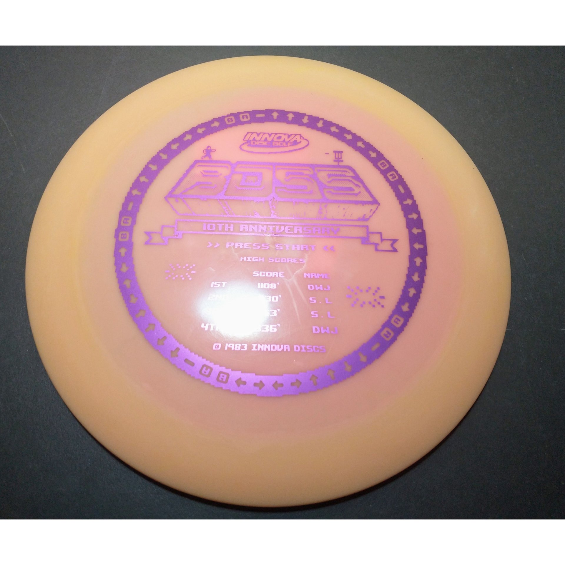 new 10th anniversary Star Boss 171 grams Innova disc golf purple on orange